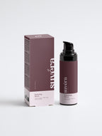 Suvera Hydrating Serum bottle with fresh botanicals on a clean white background