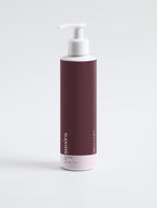 Clear bottle of Suvera Clarifying Gel Cleanser on white background