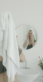 Skincare model for Suvera applying natural certified vegan face care product