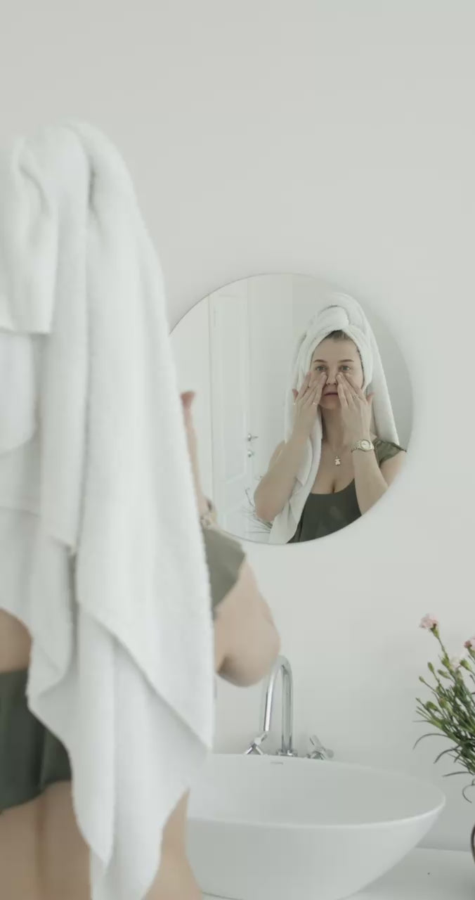 Skincare model for Suvera applying natural certified vegan face care product